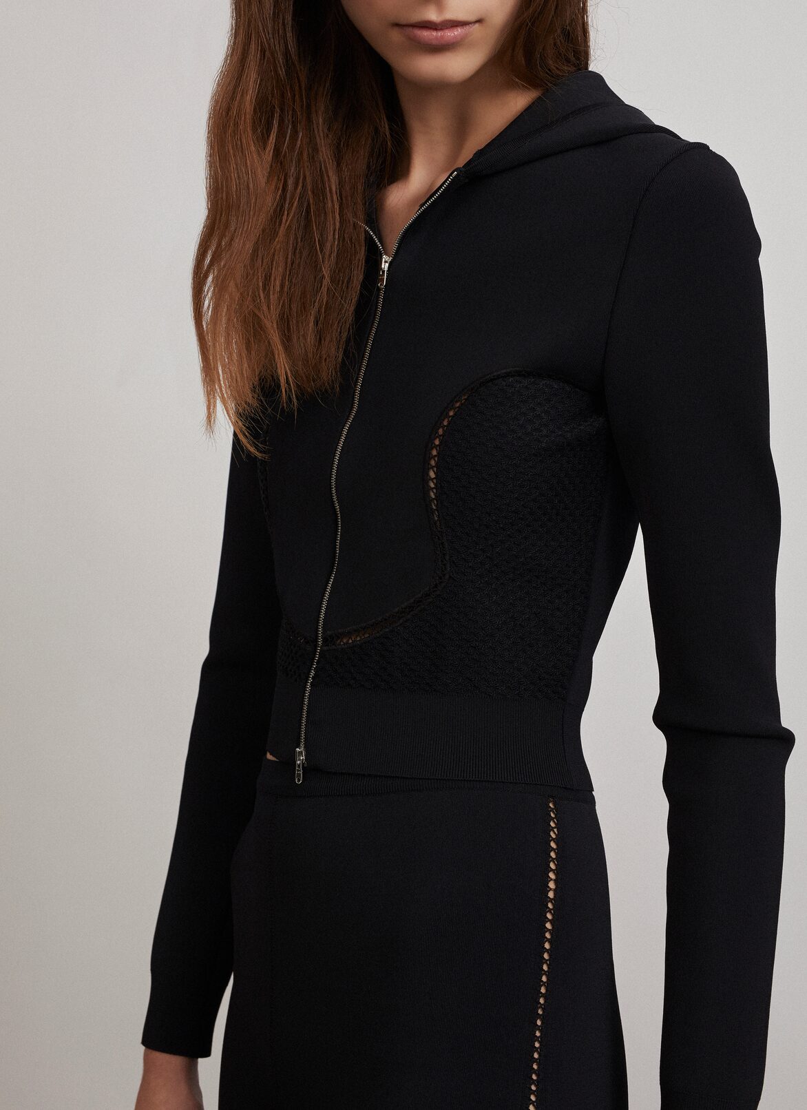 Technical knit zipped jacket
 ALAÏA BLACK TECHNICAL KNIT ZIPPED JACKET